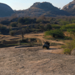 Private gypsy jeep driving through Jawai hills during leopard safari