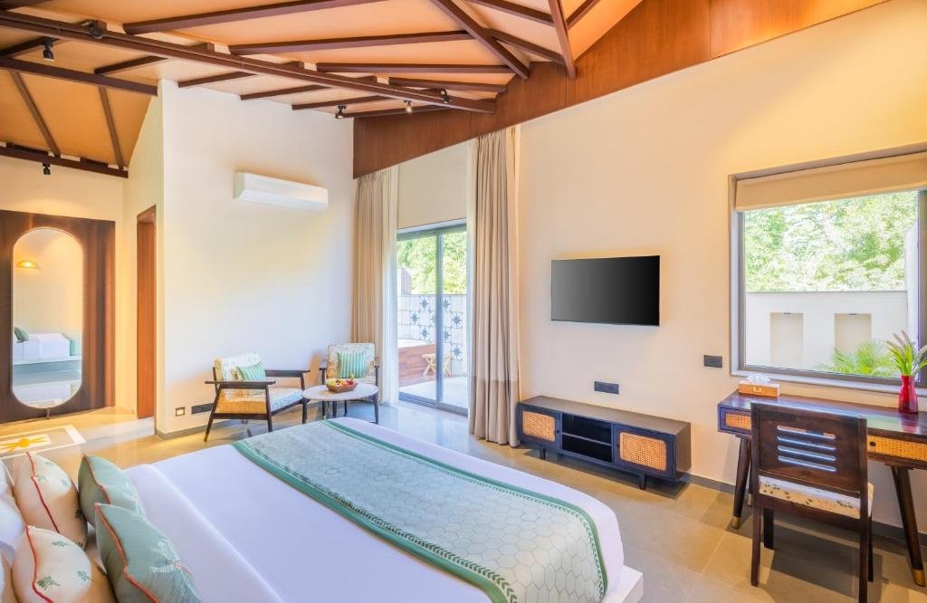 King bed and interiors of the Grand Double Room at The Forest Chapter, Jawai
